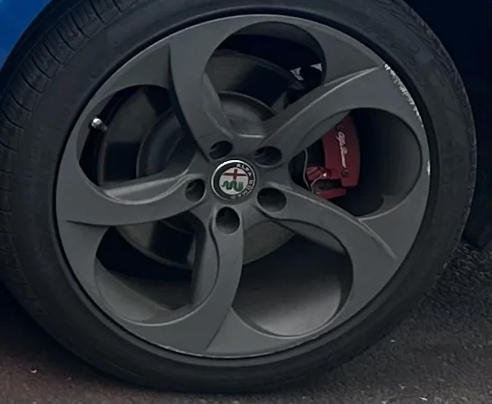 Alfa Romeo wheel before repair